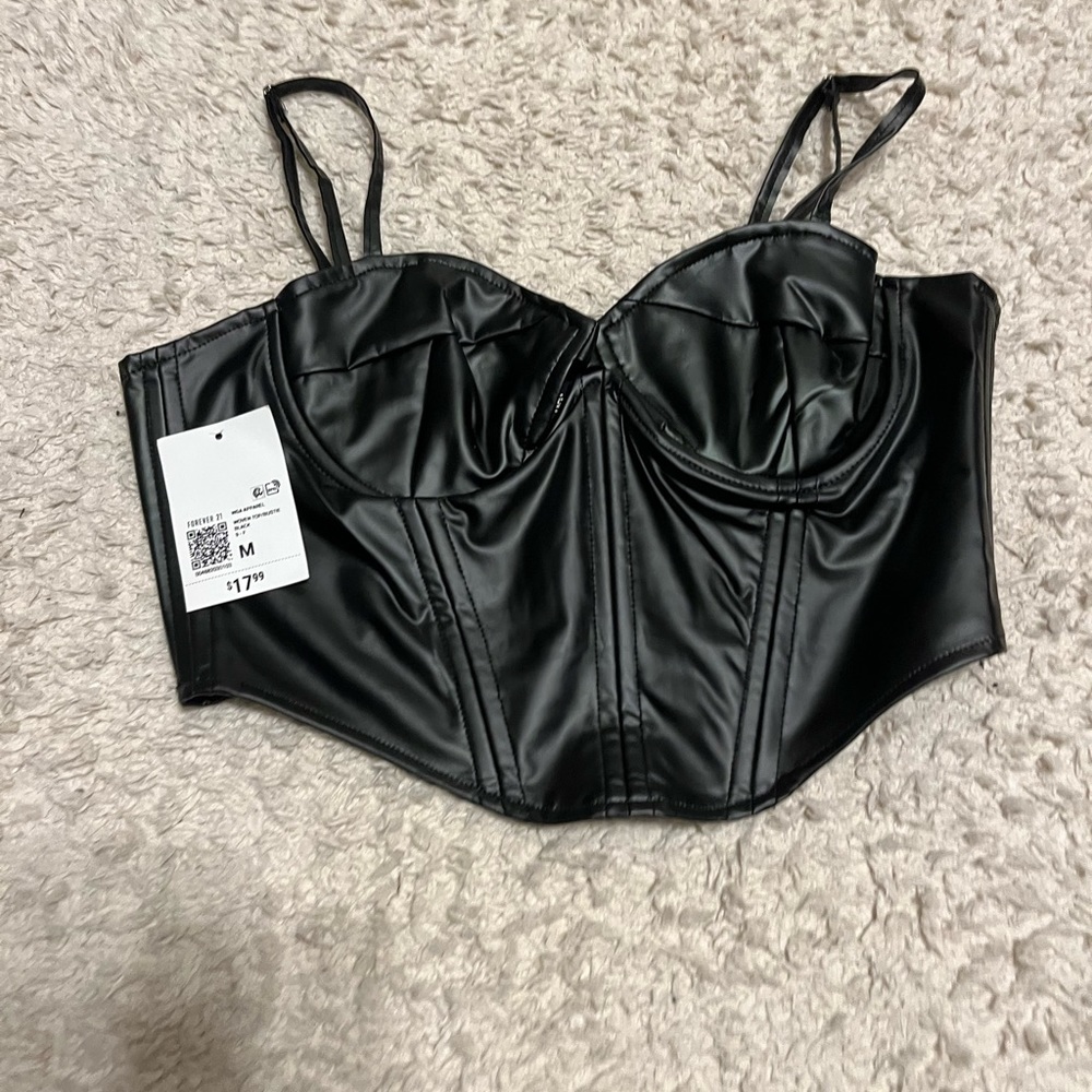 Black leather crop top. Brand new, tag fell off.